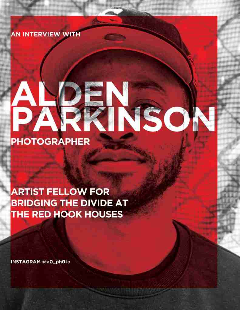 Alden Parkinson in front of one of his photos in Red Hook, Brooklyn. Photo by Pascal DuBois