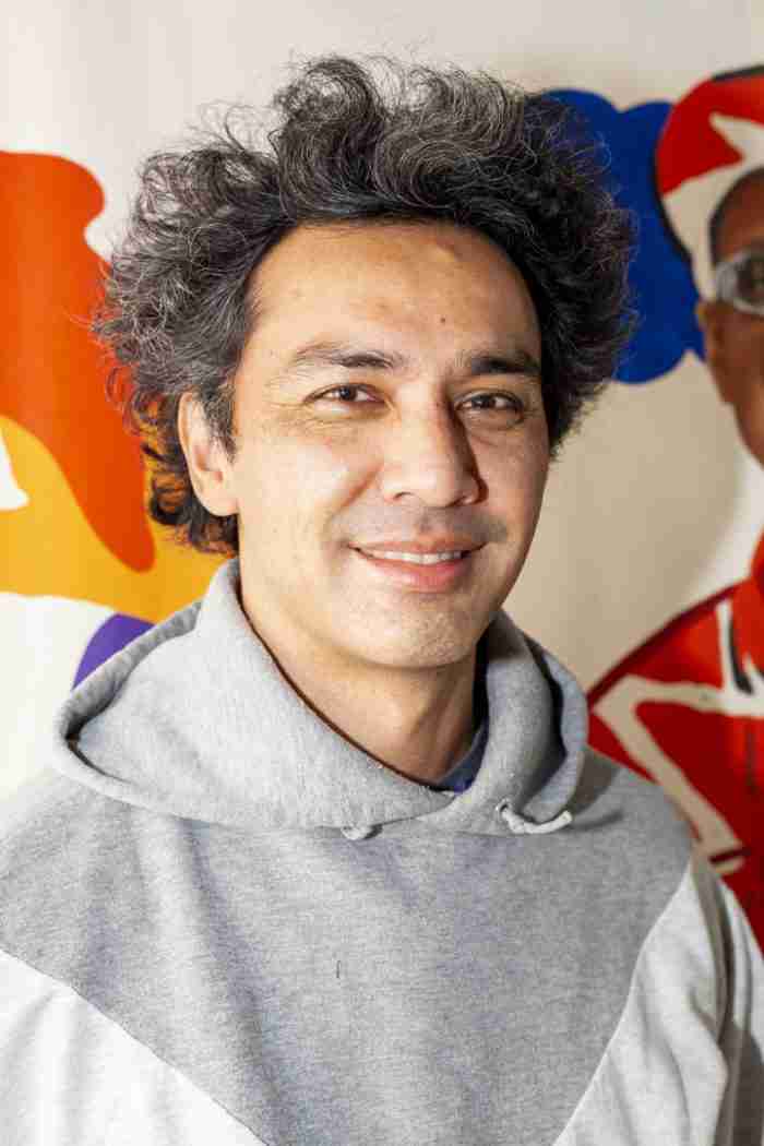 Hisham smiling